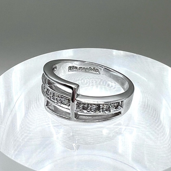 NWOT lia sophia “Splendid” Sz 7 ring, CZ wt. 0.22ct. Polished silver tone - Picture 1 of 6